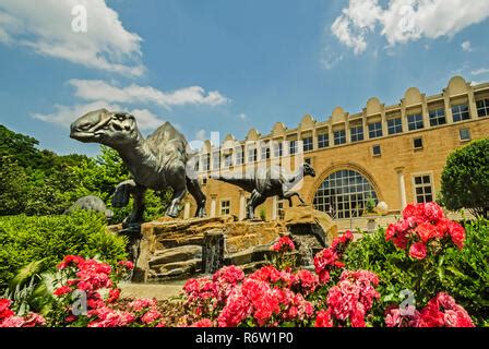 A family of bronze dinosaurs — lophorhothon atopus — frolic in the ...