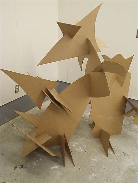 cardboard - I could turn this project into a lesson on shape and form... each student could cut ...