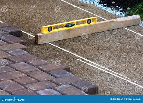 Leveling Pavers Royalty-Free Stock Image | CartoonDealer.com #9178078