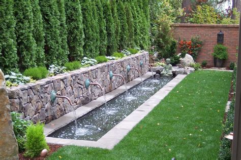 20 Stunning Backyard Waterfall Designs