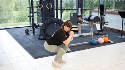 I used to struggle to squat with correct form: here's how adding a resistance band changed ...