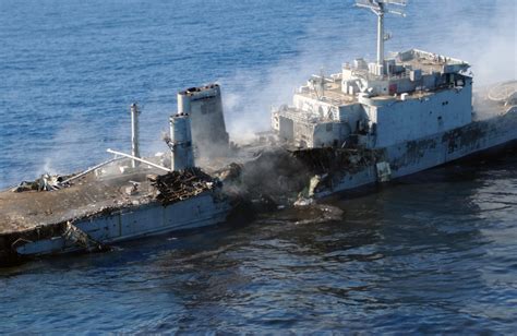 Newport class tank landing ship USS Schenectady (LST-1185) after being hit by seven 2,000lb JDAM ...