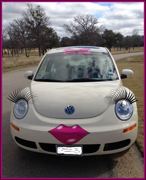 Pink Volkswagen Beetle Convertible With Eyelashes