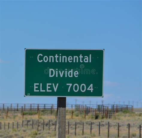 The Continental Divide Sign in Yellowstone National Park, Wyoming Stock Photo - Image of ...