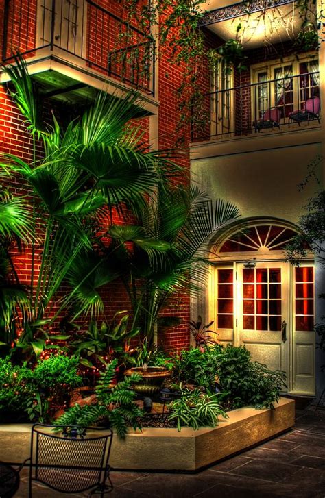 French Quarter Courtyard Photograph by Greg and Chrystal Mimbs