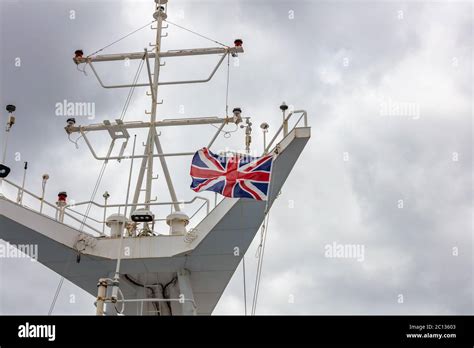 Great Britain's flag waving in the wind on the ship's mast Stock Photo - Alamy