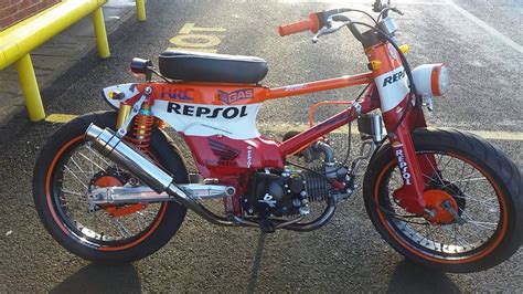 Check out this awesome custom Repsol Honda C90 Cub | BeMoto