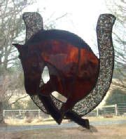 Horse jumping thru horseshoe | Stained glass crafts, Stained glass