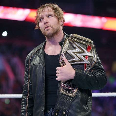 Dean Ambrose celebrates his WWE World Heavyweight Championship victory: photos