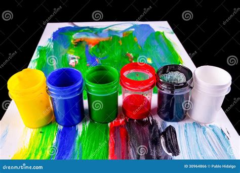 Paint Pots in Assorted Colors Stock Photo - Image of background, home: 30964866