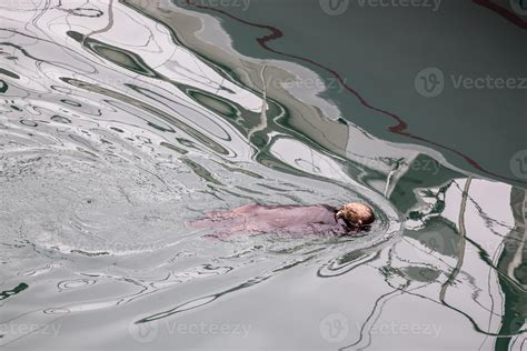 Sea Otter swimming in the sea at Monterey 6756774 Stock Photo at Vecteezy