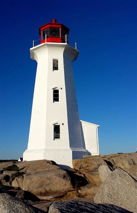 Peggy's Cove Lighthouse Photograph by Judith Macedo - Pixels