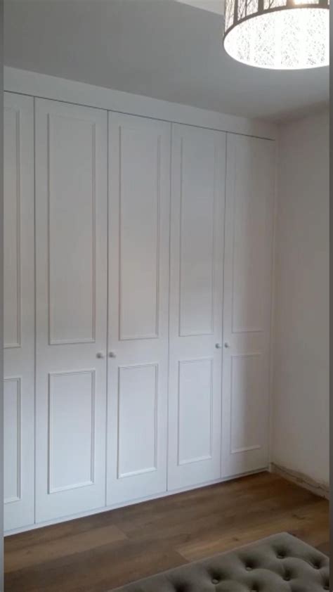 Six door wardrobe with drawers shelves and clothing rails to store all ...