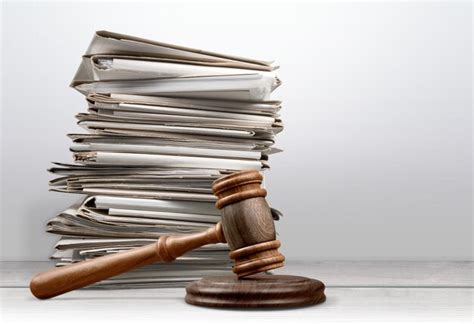 Premium Photo | Piles judicial court files and judge gavel on the desk