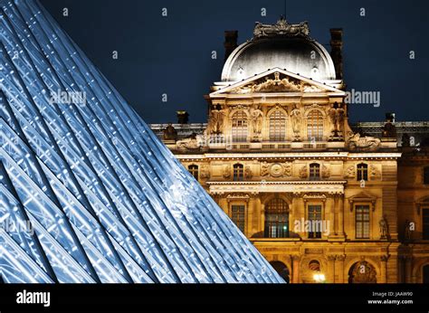 Louvre Museum in Paris, France by night Stock Photo - Alamy