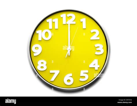 yellow clock face midday 12 o'clock the clock strikes twelve 12 Stock ...