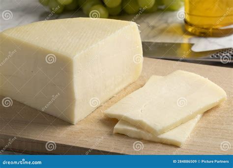 Piece of Artisanal Semi Soft Italian Bel Paese Cheese and Slices Stock ...