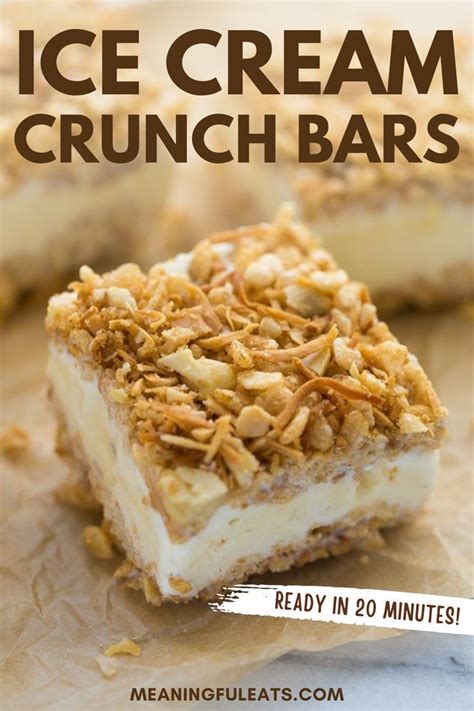 A square of an ice cream crunch bar with vanilla ice cream in between ...