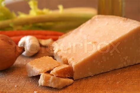 Block of parmesan cheese and fresh ... | Stock Photo | Colourbox