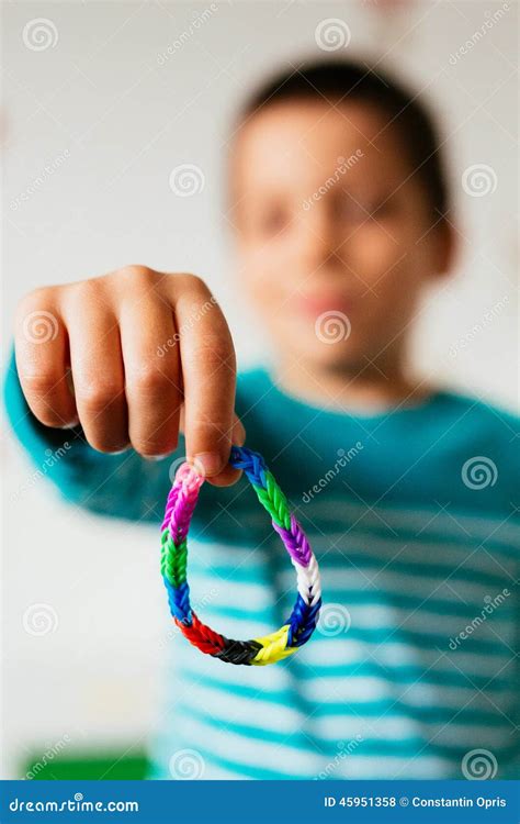 Boy Showing Friendship Bracelet Stock Photo - Image of children, funny ...