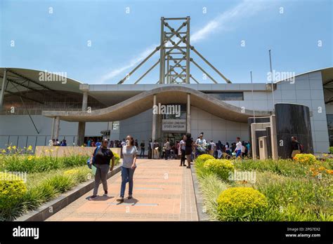 Students walking off after finishing an exam in a hall on the ...