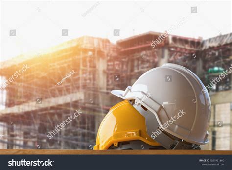 Yellow White Helmet Safety Construction Site Stock Photo 1021931860 | Shutterstock