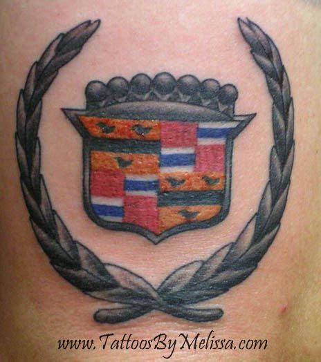 Cadillac symbol tattoo on the back of an arm Artist: Melissa Capo www.TattoosByMelissa.com ...