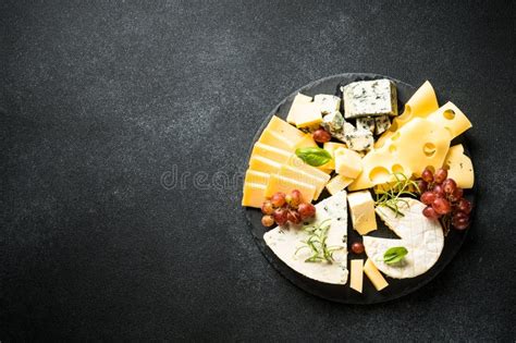 Cheese Platter with Craft Cheese Assortment at Black Background. Stock Image - Image of platter ...