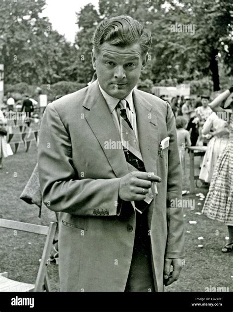 BENNY HILL (1924-1992) at a charity garden party at Marlborough House ...