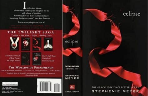 the twilight saga eclipse book cover with red ribbon on black back and white text underneath it