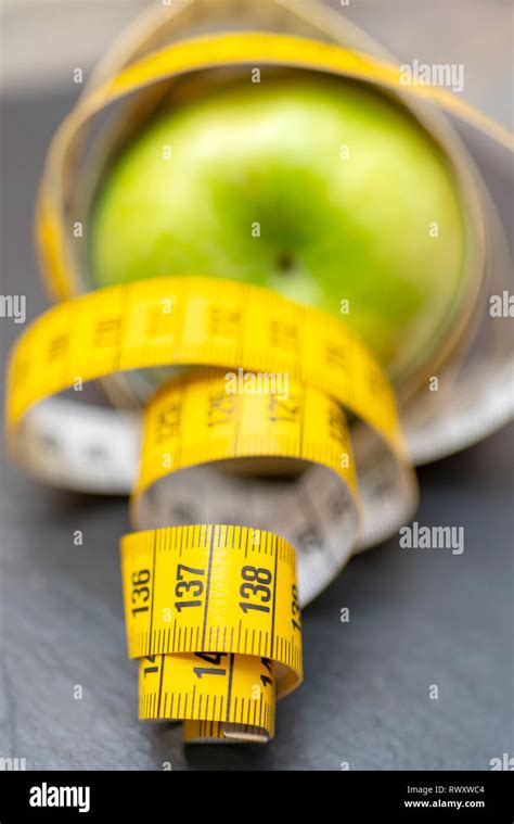 Measuring tape for measuring the circumference Stock Photo - Alamy