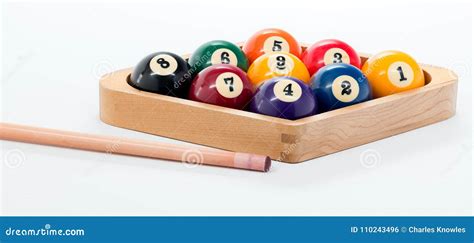 Pool Cue And Nine Ball Rack Of Balls Ready For A Billiards Game Stock Photo - Image of rack ...