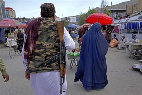 Afghan women defy burqa order as Taliban internal divide deepens ...