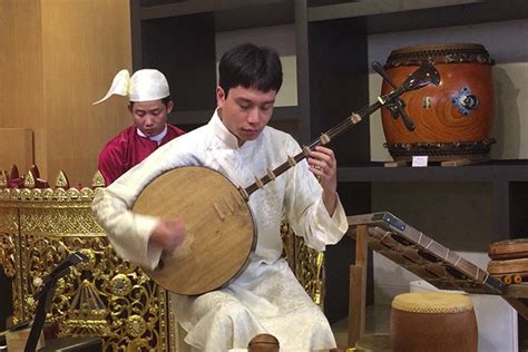 Vietnamese Traditional Instrument Dan Nguyet - Vietnam Vacation