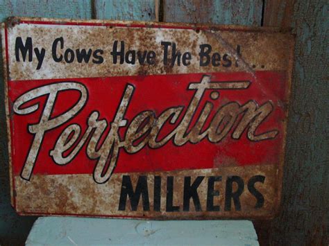 ANTIQUE DAIRY FARM PERFECTION MILKERS ADVERTISING TIN SIGN