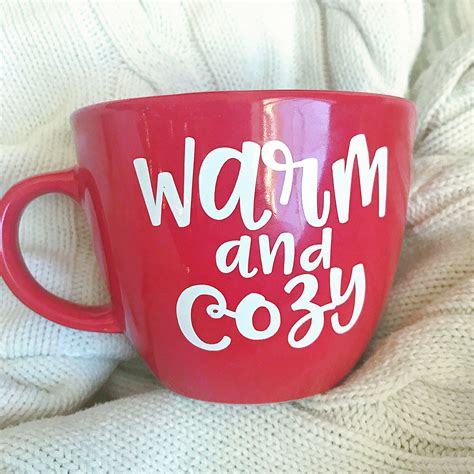 Warm and cozy vinyl coffee mug | Diy christmas mugs, Vinyl gifts, Christmas mugs