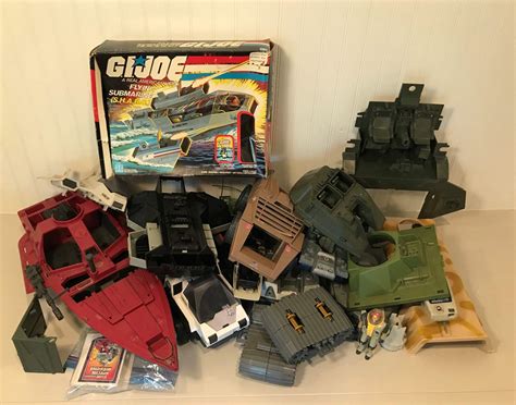 Lot # 42 VINTAGE GI JOE VEHICLE PARTS & ACCESSORIES - Movin On Estate Sales