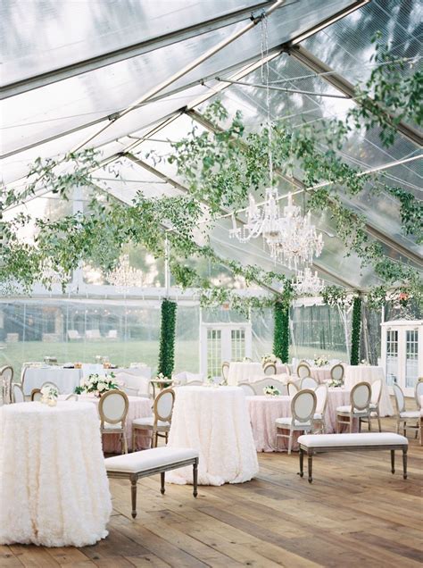 Smilax Greenery and Chandeliers for this Clear Top Tent at a Private Farm in 2020 | Tent wedding ...