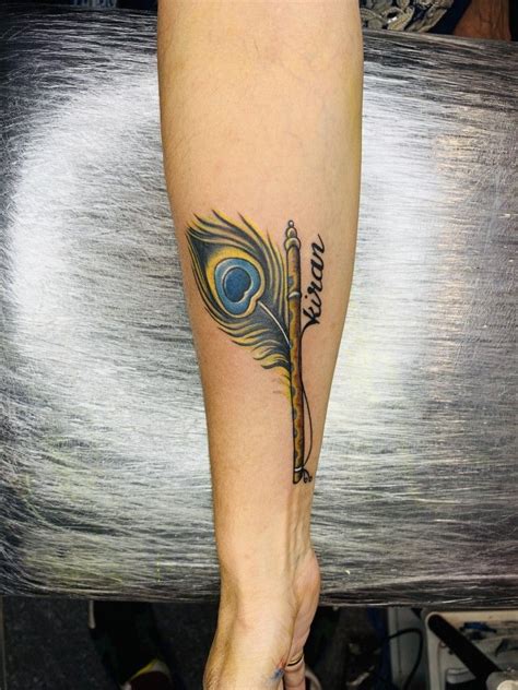 Mor Pankh Tattoo | Mor pankh tattoo, Feather tattoo black, Hand tattoos ...