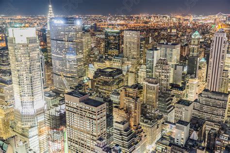 Downtown night view seen from the top of the Rock - stock photo | Crushpixel