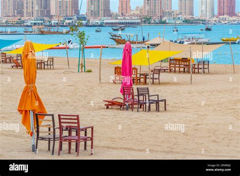 Skyline of Doha viewed behind Katara beach, Qatar Stock Photo - Alamy