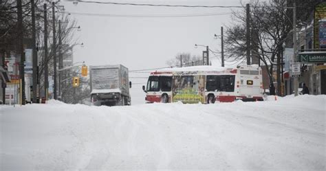 Toronto roads, transit services struggle as winter snow storm continues ...