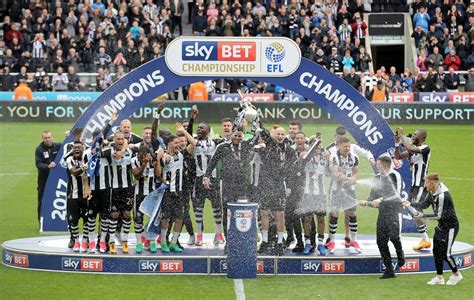 Newcastle United players celebrate after winning the Sky Bet ...