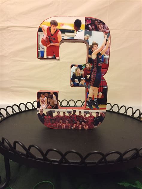 a cake with the number five on it and photos of basketball players in ...