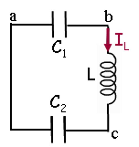 Solved A circuit is constructed with two capacitors and an | Chegg.com