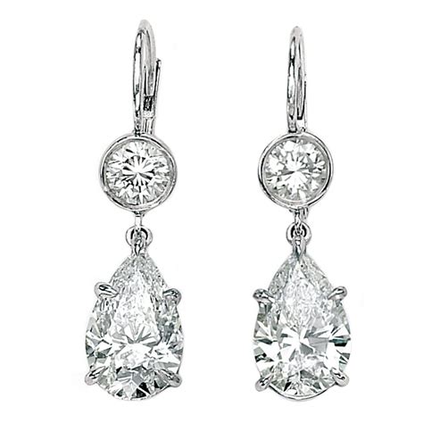 Simple Elegance Diamond Pear Shape Drop Earrings at 1stDibs