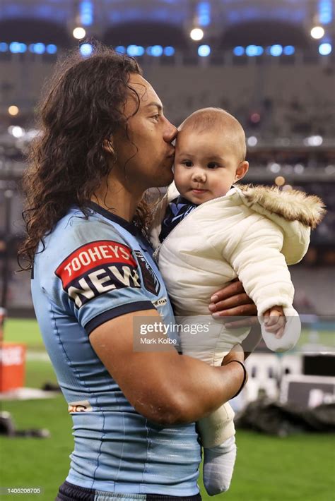 Jarome Luai of the Blues celebrates victory with family after game ...