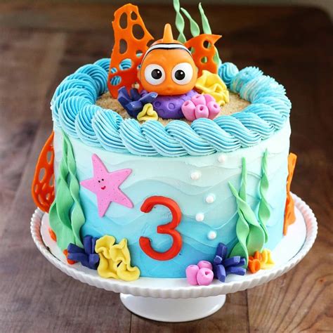 What a beautiful Nemo theme Cake 🎣😍 Just lovely 💙💛💗Creation by ...