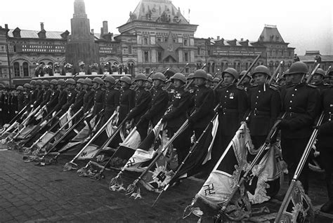[Photo] Soviet soldiers lowering German flags during the Victory Day Parade, Moscow, Russia, 24 ...