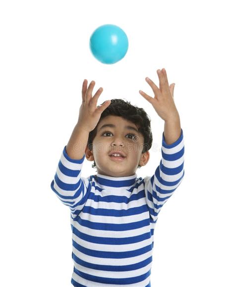 Toddler Attempting To Catch A Ball Stock Image - Image: 17902307